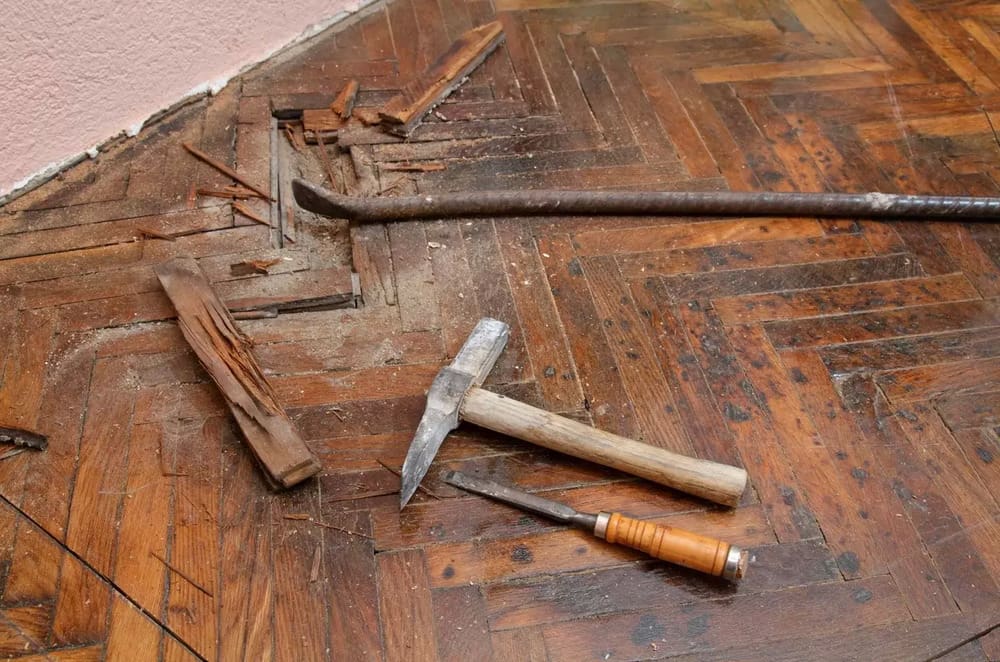 A wooden table with some tools on it