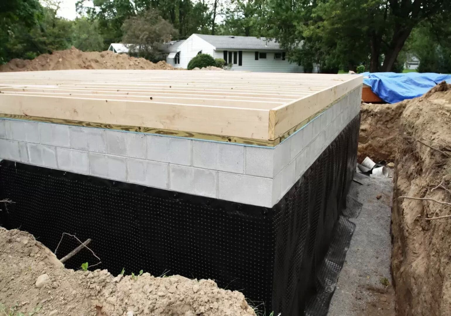 A building under construction with the roof exposed.